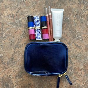 Estée Lauder lipsticks, lip liners, small pouch and Beautiful hand cream